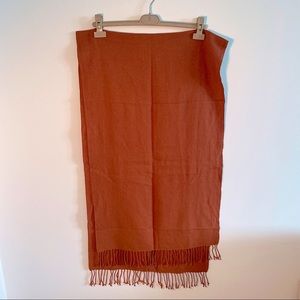 Orange heat tech scarf from Uniqlo